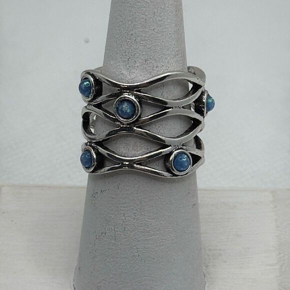 NWOT Size 9 Wavy eternity band with blue opalescent stones - Picture 1 of 4